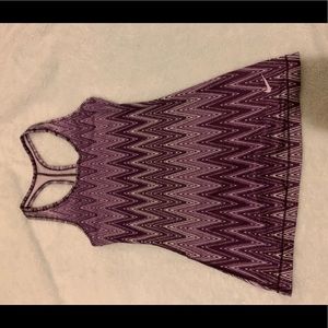 A purple and white tang top from nike